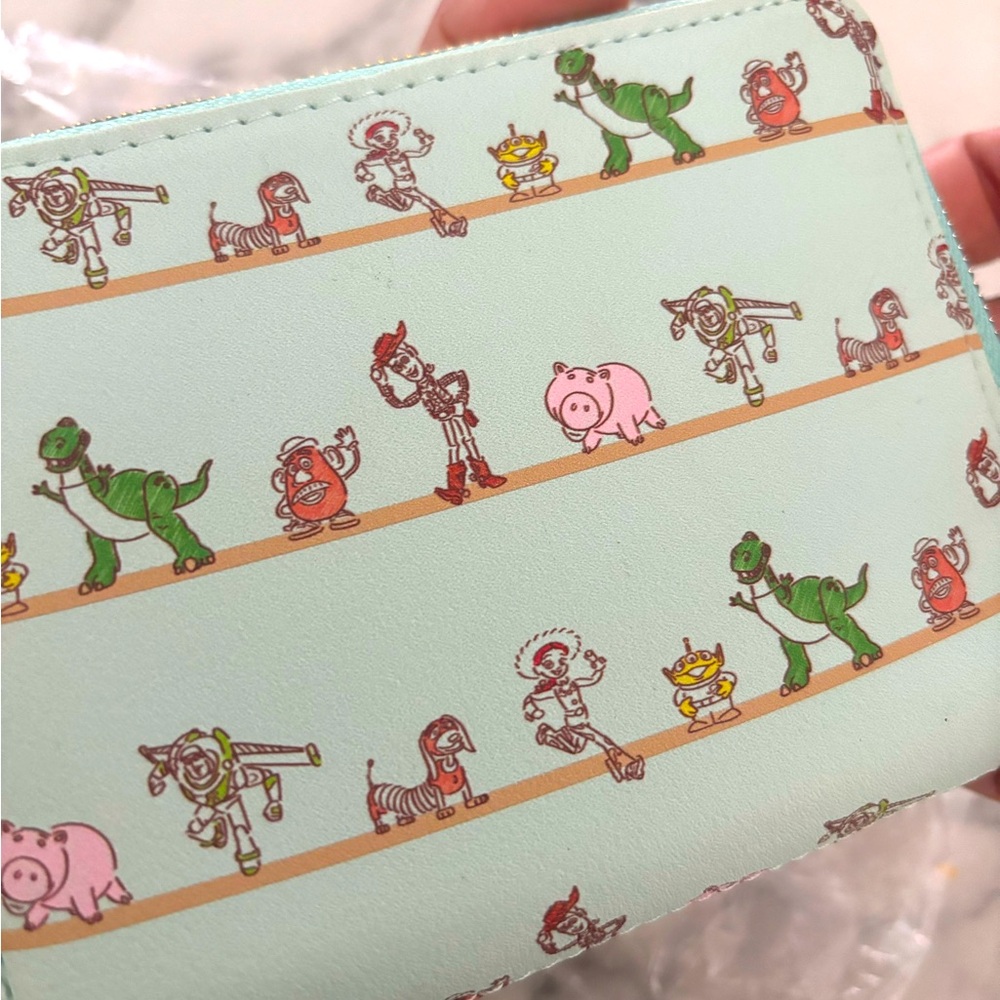 Toy story loungefly wallet baby blue!🦖 - Picture 2 of 6